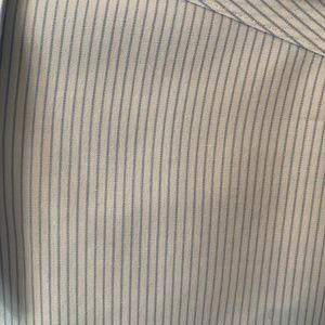 Light blue pin stripe dress shirt.